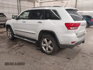 2013 Jeep Grand Cherokee Overland with VIN 1C4RJFCG7DC581808, listed as a IAAI auction lot 41242922 with 187,442 mi miles. Bid and sale history available at carsss.com. Image 3.