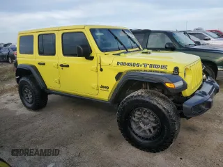 2022 Jeep Wrangler Unlimited High Tide with VIN 1C4HJXDG9NW249658, listed as a Copart auction lot 74501134 with Not Provided miles and Non Repairable. Bid and sale history available at DreamBid. Image 4.