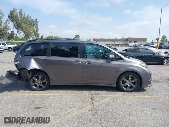 2015 Toyota Sienna SE with VIN 5TDXK3DCXFS680767, listed as a IAAI auction lot 42237107 with 105,912 mi miles and . Bid and sale history available at DreamBid. Image 14.