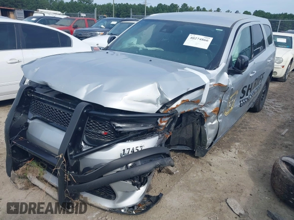 2023 Dodge Durango Pursuit with VIN 1C4SDJFT5PC629959, listed as a IAAI auction lot 40274866 with 6,877 mi miles and . Bid and sale history available at DreamBid. Image 6.