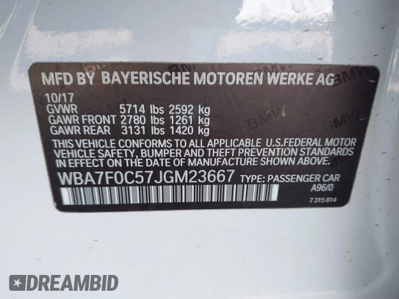 2018 BMW 7 Series 750i with VIN WBA7F0C57JGM23667, listed as a IAAI auction lot 41581035 with 113,140 mi miles and . Bid and sale history available at DreamBid. Image 9.