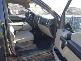 2015 Ford F-150 XLT with VIN 1FTEW1EP0FFC39327, listed as a IAAI auction lot 41012296 with 198,611 mi miles. Bid and sale history available at carsss.com. Image 5.
