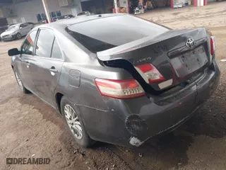 2010 Toyota Camry with VIN 4T4BF3EK8AR004909, listed as a IAAI auction lot 41451448 with 310,685 mi miles. Bid and sale history available at carsss.com. Image 3.