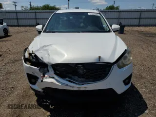 2014 Mazda CX-5 Touring with VIN JM3KE2CY9E0305244, listed as a Copart auction lot 56205605 with 164,516 mi miles and Salvage Title. Bid and sale history available at DreamBid. Image 5.