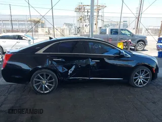 2013 Cadillac XTS Luxury with VIN 2G61P5S35D9105460, listed as a IAAI auction lot 42582313 with 144,895 mi miles and . Bid and sale history available at DreamBid. Image 13.