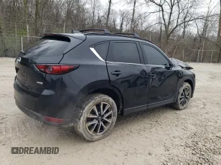2018 Mazda CX-5 Grand Touring with VIN JM3KFBDM0J0327927, listed as a Copart auction lot 51800825 with 203,126 mi miles and Clean Title. Bid and sale history available at carsss.com. Image 3.