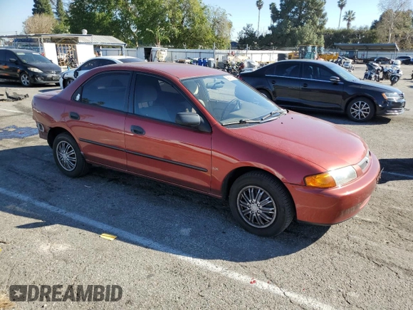 1998 Mazda Protege DX z VIN JM1BC1411W0198007, wystawiony jako Copart lot #46941185 z przebiegiem 101 696 mil mil oraz Szkoda całkowita • Salvage title. Historia ofert i sprzedaży dostępna na DreamBid. Obrazek 4.
