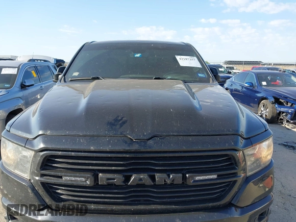 2021 Ram 1500 Big Horn with VIN 1C6SRFFT1MN520081, listed as a IAAI auction lot 42187257 with 186,011 mi miles and . Bid and sale history available at DreamBid. Image 6.