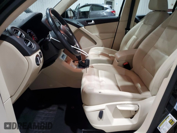 2017 Volkswagen Tiguan S with VIN WVGBV7AX8HK016490, listed as a Copart auction lot 56222815 with 48,439 mi miles and Salvage Title. Bid and sale history available at DreamBid. Image 7.