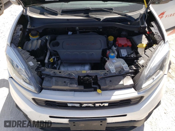 2022 Ram ProMaster City Cargo Tradesman with VIN ZFBHRFAB6N6W69795, listed as a Copart auction lot 66394033 with 10,399 mi miles and . Bid and sale history available at DreamBid. Image 12.