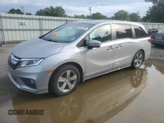 2018 Honda Odyssey EX-L with VIN 5FNRL6H74JB099282, listed as a Copart auction lot 55031025 with 137,359 mi miles and Salvage Title. Bid and sale history available at DreamBid. Image 1.