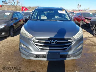 2016 Hyundai Tucson SE with VIN KM8J33A45GU089996, listed as a IAAI auction lot 41687069 with 129,957 mi miles. Bid and sale history available at carsss.com. Image 12.