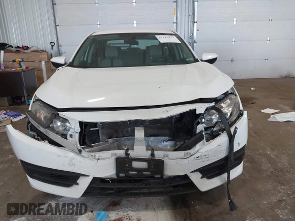 2017 Honda Civic LX with VIN 19XFC2F5XHE007668, listed as a IAAI auction lot 42219927 with 132,444 mi miles and . Bid and sale history available at DreamBid. Image 12.