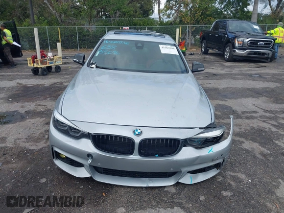 2018 BMW 4 Series 440i with VIN WBA4J5C57JBF07227, listed as a IAAI auction lot 41562986 with 76,316 mi miles and . Bid and sale history available at DreamBid. Image 12.