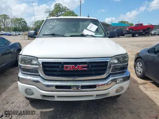 2005 GMC Sierra 1500 SLE with VIN 2GTEK13T851151711, listed as a IAAI auction lot 41964392 with 202,073 mi miles. Bid and sale history available at carsss.com. Image 13.