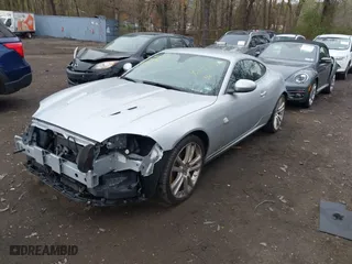 2008 Jaguar XK with VIN SAJWA43C889B21570, listed as a IAAI auction lot 42082547 with 99,783 mi miles. Bid and sale history available at carsss.com. Image 18.