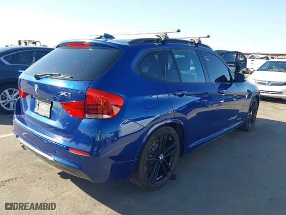2015 BMW X1 xDrive28i with VIN WBAVL1C56FVY32753, listed as a IAAI auction lot 41759454 with 130,823 mi miles. Bid and sale history available at carsss.com. Image 4.