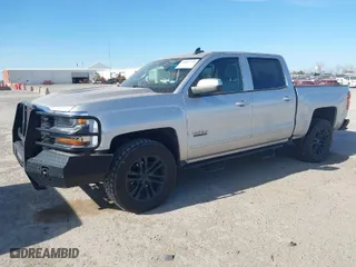 2018 Chevrolet Silverado 1500 LT with VIN 3GCPCREC4JG644935, listed as a IAAI auction lot 41821716 with 80,395 mi miles. Bid and sale history available at carsss.com. Image 2.