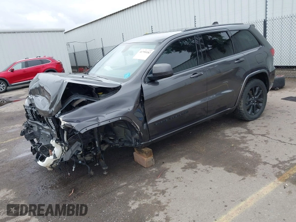 2017 Jeep Grand Cherokee Laredo with VIN 1C4RJFAG9HC885716, listed as a IAAI auction lot 41795182 with 110,613 mi miles. Bid and sale history available at carsss.com. Image 2.