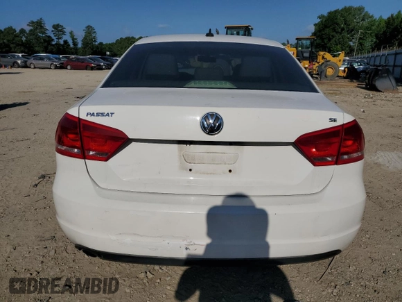 2013 Volkswagen Passat SE with VIN 1VWBP7A34DC008268, listed as a Copart auction lot 63002035 with 180,787 mi miles and Salvage title. Bid and sale history available at DreamBid. Image 6.