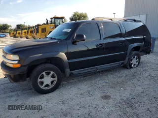 2004 Chevrolet Suburban Z71 with VIN 3GNFK16Z14G117823, listed as a Copart auction lot 74118104 with 136,042 mi miles and Salvage Title. Bid and sale history available at carsss.com. Image 1.