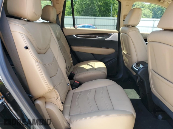 2023 Cadillac XT6 AWD Premium Luxury z VIN 1GYKPFRS2PZ162059, wystawiony jako Copart lot #63882963 z przebiegiem 6 567 mil mil oraz . Historia ofert i sprzedaży dostępna na DreamBid. Obrazek 11.