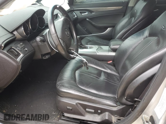 2009 Cadillac CTS RWD w/1SA with VIN 1G6DF577590150928, listed as a Copart auction lot 75338354 with 127,997 mi miles and Salvage Title. Bid and sale history available at carsss.com. Image 7.