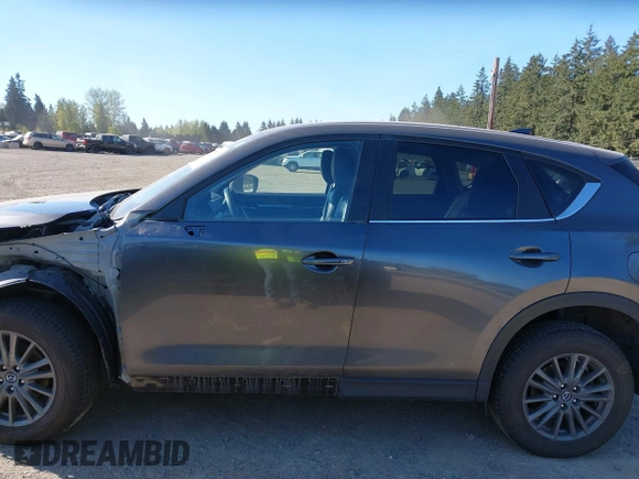 2021 Mazda CX-5 Touring with VIN JM3KFBCM7M1370676, listed as a IAAI auction lot 41975127 with 41,574 mi miles. Bid and sale history available at carsss.com. Image 15.