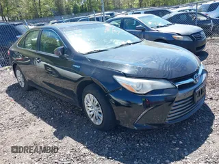2015 Toyota Camry LE z VIN 4T1BD1FK4FU161024, wystawiony jako IAAI lot #42218799 z przebiegiem 257 933 mil mil oraz . Historia ofert i sprzedaży dostępna na DreamBid. Obrazek 1.