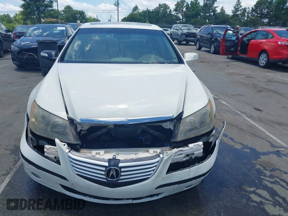 2006 Acura RL with VIN JH4KB16566C003955, listed as a IAAI auction lot 42526580 with 191,823 mi miles and . Bid and sale history available at DreamBid. Image 12.