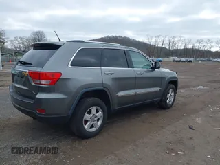 2012 Jeep Grand Cherokee Laredo with VIN 1C4RJFAG0CC270545, listed as a IAAI auction lot 41940781 with 200,529 mi miles. Bid and sale history available at carsss.com. Image 4.