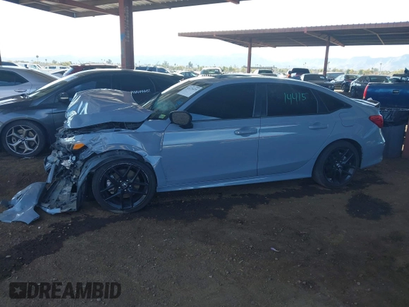 2022 Honda Civic Si with VIN 2HGFE1E58NH473302, listed as a IAAI auction lot 41473435 with 34,685 mi miles and . Bid and sale history available at DreamBid. Image 14.