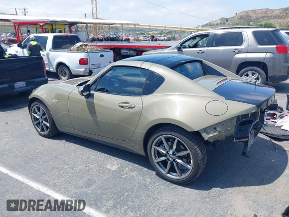 2023 Mazda MX-5 Miata Grand Touring z VIN JM1NDAM73P0561844, wystawiony jako IAAI lot #42195198 z przebiegiem 6 020 mil mil oraz . Historia ofert i sprzedaży dostępna na DreamBid. Obrazek 3.