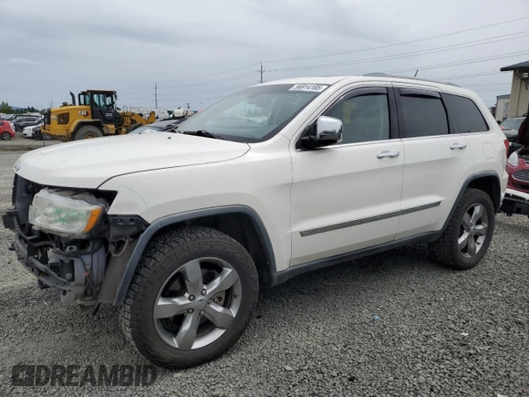 2011 Jeep Grand Cherokee Overland with VIN 1J4RR6GT9BC696319, listed as a Copart auction lot 56914185 with 211,661 mi miles and Salvage title. Bid and sale history available at DreamBid. Image 1.