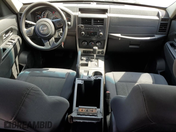 2011 Jeep Liberty Sport with VIN 1J4PN2GK9BW570298, listed as a Copart auction lot 53944155 with 99,511 mi miles and Salvage Title. Bid and sale history available at DreamBid. Image 8.