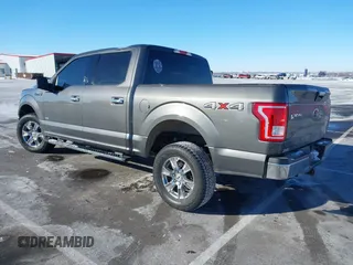 2015 Ford F-150 XLT with VIN 1FTEW1EG5FKF22006, listed as a IAAI auction lot 41637056 with 112,235 mi miles. Bid and sale history available at carsss.com. Image 3.
