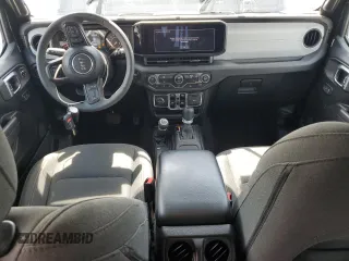2024 Jeep Wrangler Sport S with VIN 1C4PJXDN2RW153564, listed as a Copart auction lot 58800705 with 19,633 mi miles and Salvage title. Bid and sale history available at DreamBid. Image 8.