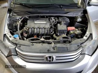 2010 Honda Insight EX with VIN JHMZE2H76AS021610, listed as a Copart auction lot 62992225 with 162,974 mi miles and Salvage title. Bid and sale history available at DreamBid. Image 11.