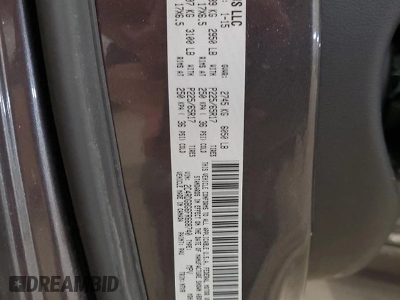 2015 Dodge Grand Caravan SE with VIN 2C4RDGBG6FR668740, listed as a Copart auction lot 50211885 with 129,695 mi miles and Salvage Title. Bid and sale history available at DreamBid. Image 13.