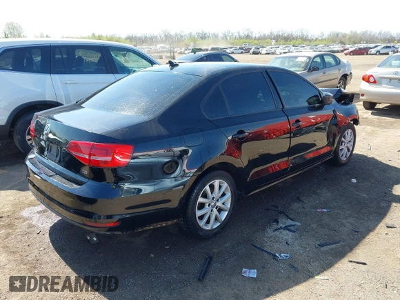 2015 Volkswagen Jetta SE z VIN 3VWD17AJ2FM318882, wystawiony jako IAAI lot #42041914 z przebiegiem 97 623 mil mil oraz . Historia ofert i sprzedaży dostępna na DreamBid. Obrazek 4.