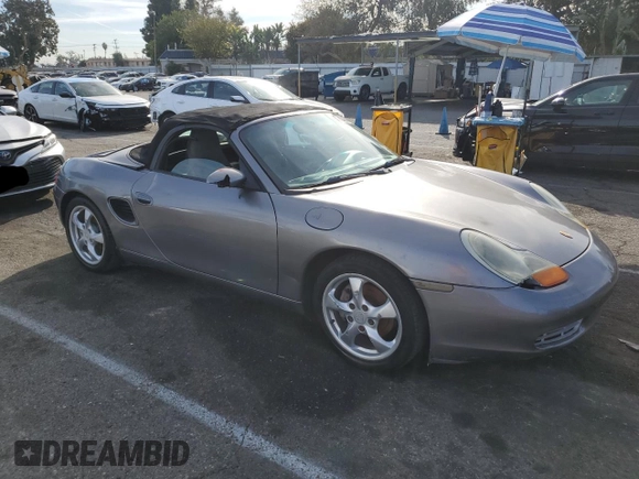 2002 Porsche Boxster z VIN WP0CA29862U621821, wystawiony jako Copart lot #85770484 z przebiegiem 121 843 mil mil oraz Czysty tytuł • Clean title. Historia ofert i sprzedaży dostępna na DreamBid. Obrazek 4.