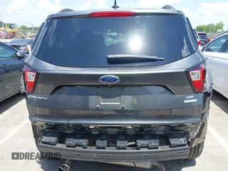 2019 Ford Escape SE z VIN 1FMCU0GD0KUB74569, wystawiony jako IAAI lot #42271476 z przebiegiem 66 335 mil mil oraz . Historia ofert i sprzedaży dostępna na DreamBid. Obrazek 6.