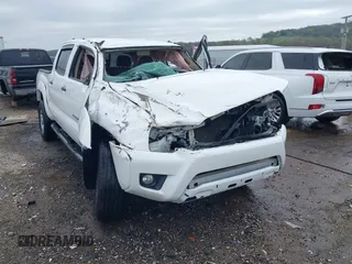 2015 Toyota Tacoma PreRunner with VIN 3TMJU4GN9FM179727, listed as a IAAI auction lot 41913998 with 153,590 mi miles and . Bid and sale history available at DreamBid. Image 1.