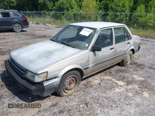 1987 Toyota Corolla with VIN JT2AE82E6H3501099, listed as a IAAI auction lot 42784065 with 178,181 mi miles and . Bid and sale history available at DreamBid. Image 2.