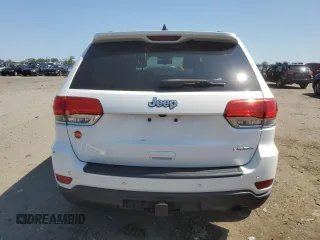 2016 Jeep Grand Cherokee Laredo with VIN 1C4RJEAG4GC500524, listed as a Copart auction lot 61613725 with 122,467 mi miles and Salvage title. Bid and sale history available at DreamBid. Image 6.