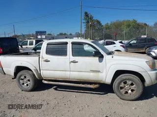 2006 Toyota Tacoma z VIN 3TMLU42N26M004719, wystawiony jako IAAI lot #40569250 z przebiegiem Nie podano mil oraz . Historia ofert i sprzedaży dostępna na DreamBid. Obrazek 13.
