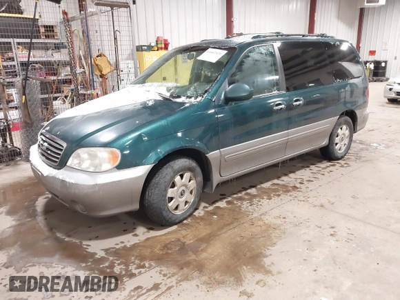 2003 Kia Sedona LX with VIN KNDUP131336390410, listed as a IAAI auction lot 41602426 with 170,613 mi miles. Bid and sale history available at carsss.com. Image 2.