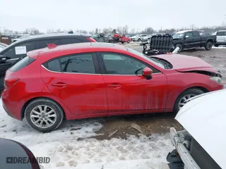 2016 Mazda Mazda3 i Grand Touring with VIN 3MZBM1N77GM245567, listed as a IAAI auction lot 41330883 with 128,423 mi miles. Bid and sale history available at carsss.com. Image 13.