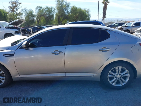2013 Kia Optima EX with VIN 5XXGN4A7XDG128799, listed as a IAAI auction lot 41631612 with 191,124 mi miles. Bid and sale history available at carsss.com. Image 14.