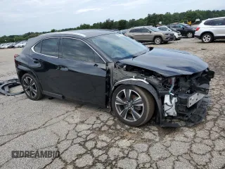 2023 Lexus UX 250h Premium с VIN JTHP6JBH8P2133821, выставлен на аукционе Copart как лот 61007355 с пробегом 32 540 миль миль и Списание • Salvage title. История ставок и продаж доступна на DreamBid. Изображение 4.